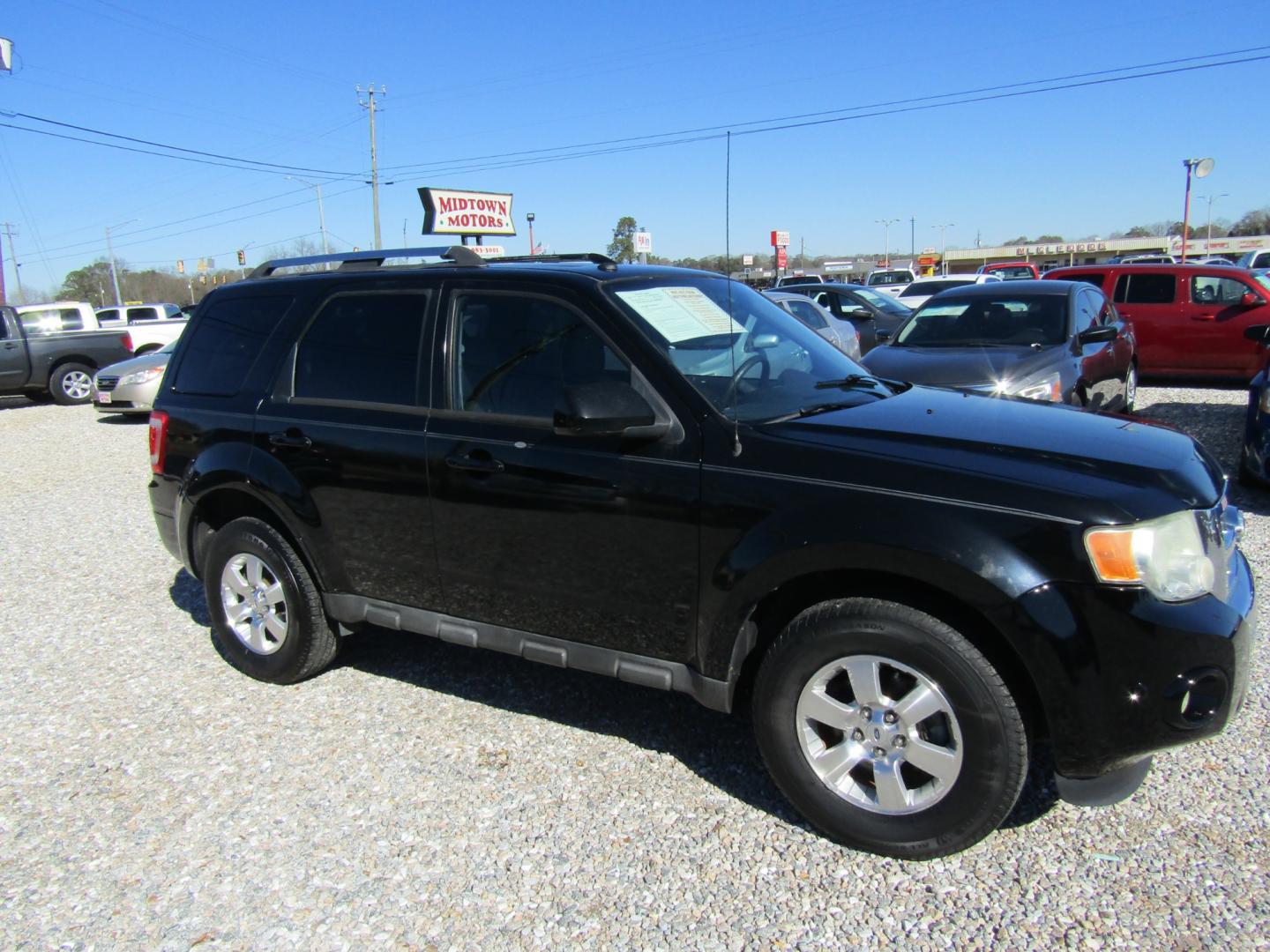 2010 Black Ford Escape Limited FWD (1FMCU0EG8AK) with an 3.0L V6 DOHC 24V engine, Automatic transmission, located at 15016 S Hwy 231, Midland City, AL, 36350, (334) 983-3001, 31.306210, -85.495277 - Photo#0